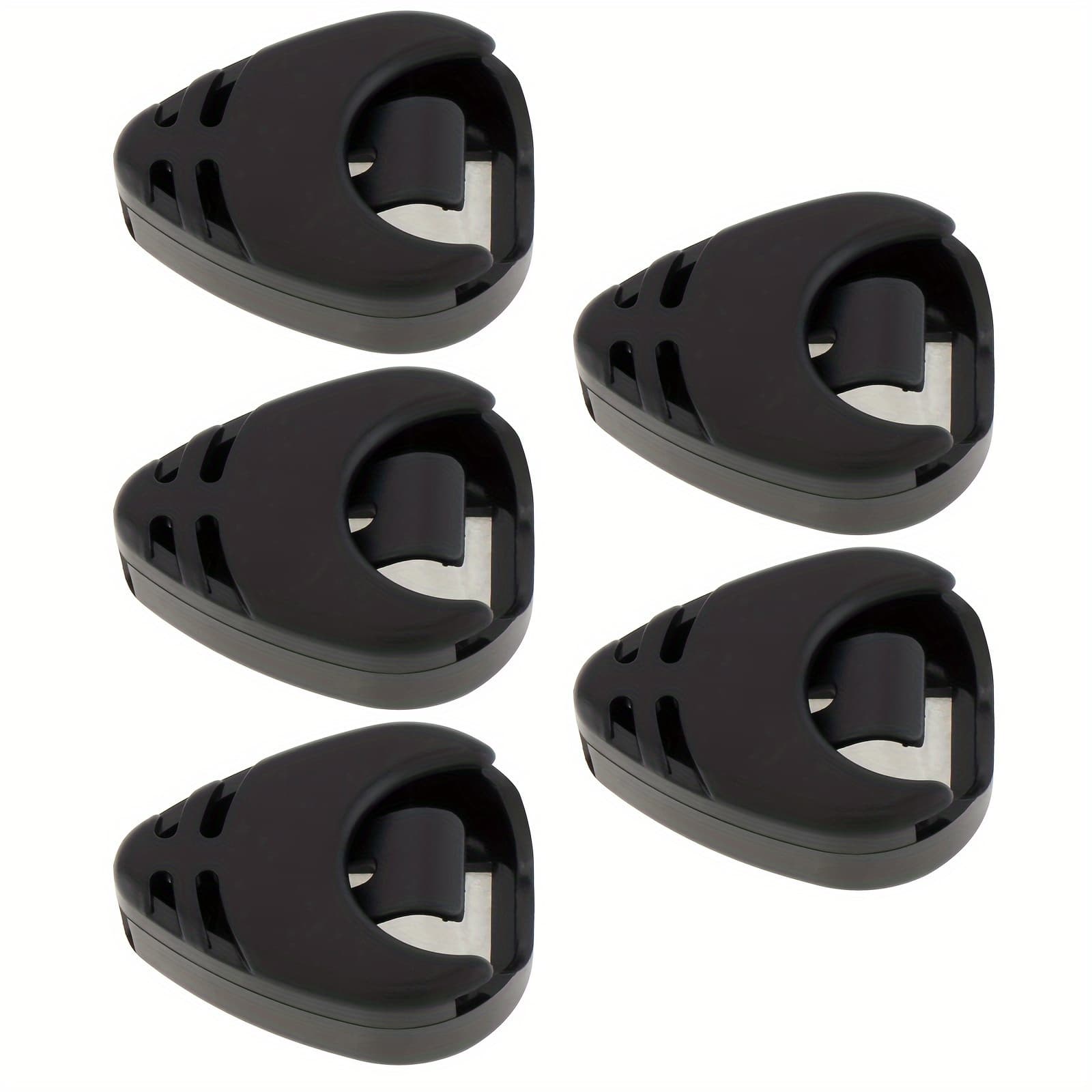 5 Black Plastic Rods On A Guitar Pick Holder, Designed For Acoustic Guitars, Basses, And Ukuleles, To Store Picks