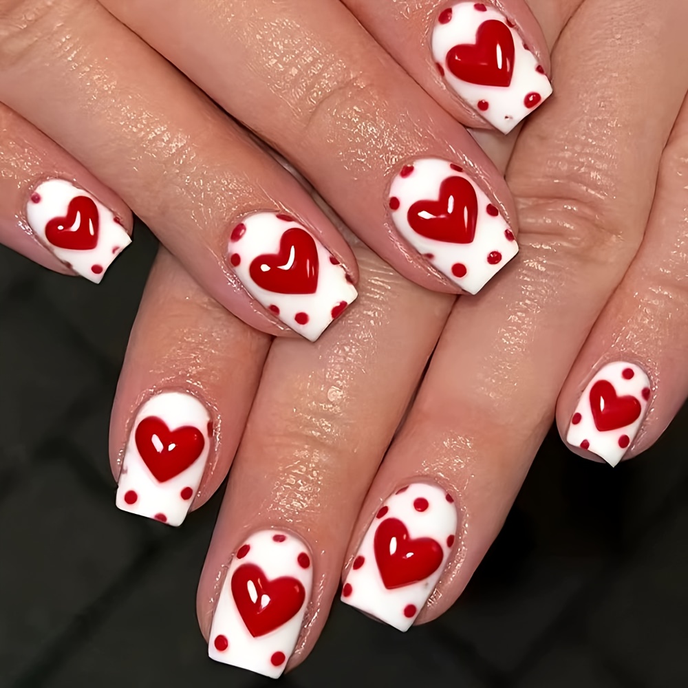 24pcs Of Short Square Ladies' Nail Accessories With Heart Pattern Love-themed Elements In A . Are Shiny Fake Nails That Extended And Detached And Gel Nail Polish.